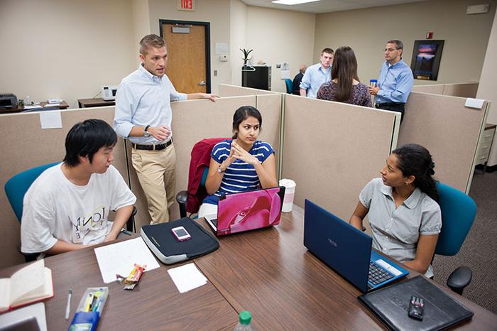 Students meeting with an advisor